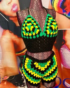 a woman's bathing suit made out of crochet and beaded beads