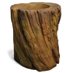 a close up of a tree stump vase on a white background