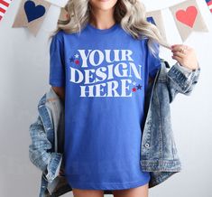 a woman wearing a blue t - shirt with the words your design here on it