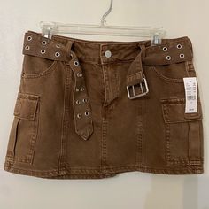 Size 27 Perfect Condition Nwt I Love This It Just Doesn’t Fit Me! Casual Brown Skort With Pockets, Y2k Style Brown Skirt For Spring, Y2k Brown Skirt For Spring, Brown Y2k Skirt For Spring, Brown Cargo Skirt With Pockets For Spring, High Waist Brown Skort With Pockets, Trendy Brown Skort With Pockets, Brown Y2k Summer Skirt, Brown Mini Skort With Pockets