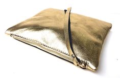 Leather pouch gold, gold leather purse, small leather bag gold Whether as cosmetic purse , pencil case or cell phone pocket ... Here stuff fits into and is well protected . Dimensions approx 16x20cm Gold Clutch Bag With Zipper Pouch, Elegant Gold Pouch Wallet, Gold Clutch Coin Purse For Everyday Use, Gold Leather Wallet For Evening, Gold Clutch Wallet For Party, Gold Mobile Phone Clutch Shoulder Bag, Gold Leather Evening Wallet, Evening Gold Leather Wallet, Gold Zipper Coin Purse For Everyday Use