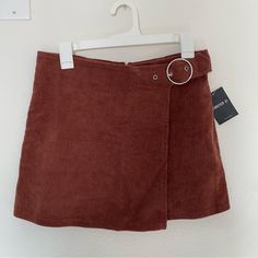 Nwt Forever 21 Rust Colored Corduroy Skirt With Buckle Detail Zipper Closure On Back If You Have Any Pet Allergies, Please Note That I Do Own A Cat Trendy Corduroy Mini Skirt, Trendy Corduroy Skirt, Trendy Spring Corduroy Skirt, Trendy Corduroy Skirt For Spring, Forever 21 Trendy Fall Skirt, Spring Mini Corduroy Skort, Forever 21 Skirt For Fall, Forever 21 Fall Skirt, Forever 21 Brown Bottoms For Fall