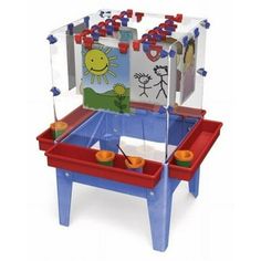 a child's play table with two mirrors and cups on the top, one in front of it