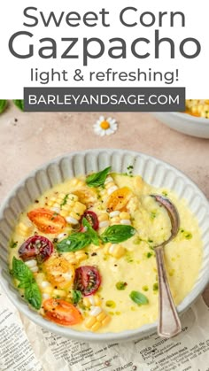 a white bowl filled with corn, tomatoes and basil on top of a paper towel