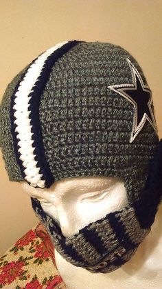 a crocheted hat with a star on it