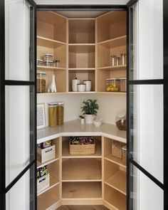 an open pantry with lots of cupboard space