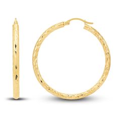 Dynamic tubes are embellished with distinctive diamond-cut patterns in these stylish women's hoop earrings. Fashioned in 14K yellow gold, the earrings secure in place with hinged backs. Luxury Yellow Gold Diamond Cut Hoop Earrings, Anniversary Yellow Gold Hinged Hoop Earrings, Small Diamond Cut Yellow Gold Hoop Earrings, Small Hoop Earrings In Yellow Gold With Diamond Cut, Small Yellow Gold Hoop Earrings With Diamond Cut, Luxury Diamond Cut 14k Gold Hoop Earrings, Luxury 14k Gold Diamond Cut Hoop Earrings, Luxury 14k Gold Hoop Earrings With Diamond Cut, Luxury Gold Hoop Earrings With Diamond Cut