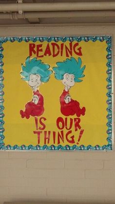 a bulletin board with the words reading is our thing? written in red and blue