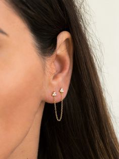 "Dainty and elegant - two little flower studs are connected by a delicate chain in this double piercing earring design. Dress it up or down, this beautiful double stud earring is perfect to add some layering to your ear stack. ♦ Sold singly (1 piece) or as a pair (2 pieces) * D E T A I L S * ∙ Material: .925 Sterling Silver or 18K Gold Plated over .925 Sterling Silver ∙ Dimensions: Flower studs: 4mm Chain: 4.5cm ∙ Hypoallergenic & nickel-free * P A C K A G I N G * ∙ All jewelry is sent out b Earrings Double Piercing, Double Piercing Earring, Double Stud Earrings, Layered Coin Necklace, Tiny Gold Studs, Double Stud, Gold Chain Earrings, Double Piercing, Gold Disc Necklace