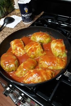 some food is cooking in a pan on the stove