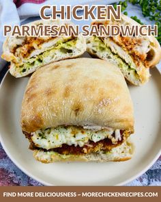 chicken parmesan sandwich cut in half on a white plate with text overlay