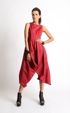 Asymmetric Tunic Dress - METD0081 A must have model for all ladies out there who dare to show their unique style! This red maxi dress is a top choice for going to work, school, a dinner or any time you want to feel and look great! The silhouette of the dress is very comfortable and easy to wear as well as eye catching - get ready for many compliments! This tunic dress is closed with a zipper on the back. Grab a few accessories and you are ready to party! This everyday dress is made of cotton. Fi Fitted Sleeveless Lagenlook Dress, Sleeveless Lagenlook Midi Dress For Spring, Spring Sleeveless Lagenlook Midi Dress, Red High-low Hem Summer Dress, Red Lagenlook Dress, Red Asymmetrical Dress For Summer, Red Sleeveless Asymmetrical Dress, Red Asymmetrical Summer Dress, Summer Lagenlook Dress With Handkerchief Hem