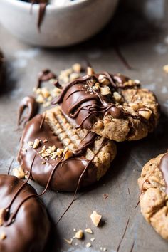 chocolate covered cookies with nuts and sprinkles