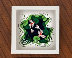 an image of two koi fish in the water with plants and leaves cut out of paper