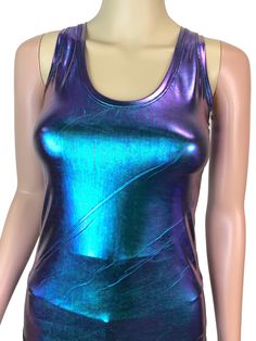 "**Due to SO MANY issues with USPS - we STRONGLY ENCOURAGE you to purchase the UPS Upgrade with your order located here: https://www.etsy.com/listing/926751536/ups-upgrade Made of holographic \"oil slick\" metallic spandex, tank fits snug to the body. The hologram spandex shines in rainbow colors in the light. Women's Sizing (See below for instructions on where measurements should be taken) Extra Small: Bust 31\"-32\" / Waist 24\"-25\" / Hips 33\"-35\" Small: Bust 33\"-34\" / Waist 26\"-28\" / H Fitted Racerback Top For Club, Metallic Fitted Activewear For Sports, Metallic Fitted Workout Activewear, Metallic Fitted Gym Activewear, Fitted Purple Racerback Activewear, Oil Slick, Rave Wear, Small Waist, Womens Tank