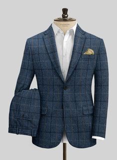 Channel boss vibes everyday with this refined Harris Tweed Gordon Blue Suit to look great in this new season. Crafted from pure wool, the suit is a stylish piece for your next elegant affair with a shade of blue that will help you charm your way through tedious tasks and an impeccable checks design that carries a timeless appeal. The suit will seamlessly blend together with your favorite shirt to create an eye catching ensemble.  Look Includes   Harris Tweed Gordon Blue Fabric  Two Button Jacket Style  Notch Lapel  Horn Royal Black Buttons  Single Vent  Three Cuff Buttons  Two Welted Back Pockets on Trousers   You can change the look during customization if required.  Lining: Viscose, Dry Clean. Navy Tweed Suit, Checks Design, Grey Tweed Suit, Boss Vibes, Herringbone Tweed Jacket, White Linen Suit, Green Velvet Jacket, Peaky Blinders Suit, Royal Blue Suit