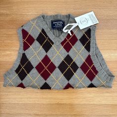 Brand New! Abercrombie & Fitch Vintage Cropped Knit Argyle Sweater Vest. 80% Cotton 20% Wool Casual Argyle Pattern Top For Fall, Fitted Argyle Sweater Vest For Winter, Casual Argyle Pattern Vest For Fall, Fall Fitted Argyle Sweater, Fall Season Argyle Sweater, Fitted Argyle Pattern Sweater For Fall, Fitted Argyle Sweater For Fall, Fitted Argyle Pattern Tops For Winter, Argyle Sweater Vest