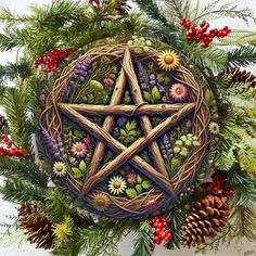 a wicker pentagram surrounded by pine cones, berries and evergreens is depicted in this painting