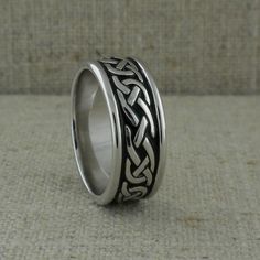 Sterling Silver Celtic Knot Wedding Ring with Black Enamel — Unique Celtic Wedding Rings Black Enamel Ring For Wedding, Black Sterling Silver Engraved Wedding Ring, Black Sterling Silver Engraved Ring For Wedding, Classic Silver Enamel Wedding Ring, White Gold Rings With Black Enamel For Wedding, Silver Rings With Black Enamel For Wedding, Silver Promise Ring With Black Enamel, Silver Wedding Ring With Black Enamel, Silver Polished Enamel Ring For Wedding