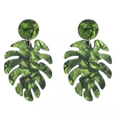 This pair of drop Palm Leaf earrings are stunning in a gleaming acrylic that dances with color throughout. Perfect for any pinup tiki outfit. Secured with post backs, you’ll be comfortable and stylish!Available while supplies last. Total length 2.25" Vintage Statement Earrings, Plant Jewelry, Retro Mode, Trendy Earrings, Acrylic Earrings, Geometric Earrings, Leaf Shapes, Tropical Plants, Tahiti