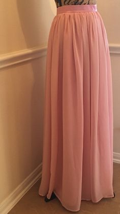 This Skirt is made of the softest chiffon and would be the perfect Wedding Skirt or Bridesmaid Dress. It can be made in ANY color, ANY length, and ANY size. Add Color desired in Personalization area when purchasing. ALL ITEMS HANDMADE BY ME IN USA Lining and waistband are made with a soft satin fabric of the same or contrasting color as the chiffon. The satin waistband is flat with zipper and hook/eye closure in back. Elastic can be added to the back of the waistband, however only allows for a l Sage Green Skirt, Custom Tulle Skirt, Skirt Bridesmaid Dresses, Tulle Skirt Bridesmaid, Grey Tulle Skirt, Custom Skirt, Bridesmaid Dress Chiffon, Womens Tulle Skirt, Long Chiffon Skirt