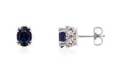 "Such a fabulous pair of sapphire stud earrings set in your choice of 14K yellow gold, 14K white gold or 14K rose gold. Perfect oval shape, hand selected and set sapphire gemstones are a vibrant blue color. Quality blue sapphire gemstones each measure 7 x 5mm with a total weight of 1.8 carats. Heavy duty 14K gold oval basket settings have fabulous scroll detail that help showcase the size & quality of these gemstones. Earrings are constructed with standard post and friction, push-on style ba Elegant Round Cut Sapphire Earrings, White Gold Earrings With Lab-created Sapphire For Formal Occasions, Luxury Lab-created Sapphire Earrings For Formal Occasions, Luxury Lab-created Sapphire Earrings For Formal Events, Elegant Round Lab-created Sapphire Earrings, Fine Jewelry Sapphire Round Cut Earrings, Elegant Sapphire Earrings With Diamond Cut, Elegant Sapphire Earrings With Polished Finish, Classic Sapphire Earrings For Anniversary