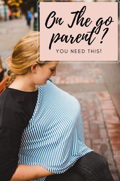 a woman sitting on the ground with her back turned to the camera and text overlay that reads, on the go parent? you need this