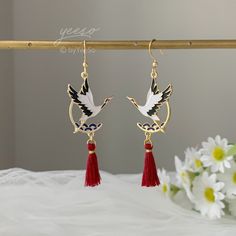 Crane with Red Tassel Earrings Dangle, Japanese Crane Earrings, Oriental Red Earrings, unique earrings Dangle 🤍 Hypoallergenic 🌸 Handmade with love ✨ Cute & Dainty  🎁 Gift ready 〰️Click👇🏻 Find more Earrings🎀  https://www.etsy.com/shop/byYeeSo ◽️ PACKAGING ◽️  * The jewelry will be nicely packaged * Comes with a drawstring suede pouch * If you need personalized gift note, please click the link below, add it to your cart when check out to upgrade your packaging. https://www.etsy.com/listing/1008661207/upgrade-gift-packaging?ref=shop_home_active_1&frs=1 ◽️ SHIPPING ◽️ * USPS First Class Shipping Service with tracking number * All products will be shipped from USA ◽️ CARE INSTRUCTIONS ◽️ * Avoid perfumes or sprays * Avoid getting your jewelry wet * Wipe down the jewelry to remove oils an Elegant Red Tassel Earrings As Gift, Elegant Red Tassel Earrings For Gift, Elegant Red Handmade Tassel Earrings, Elegant Handmade Red Tassel Earrings, Elegant Red Tassel Drop Earrings, Handmade Elegant Red Tassel Earrings, Handmade Red Tassel Earrings, Elegant Style, Red Chandelier Earrings As Gift, Red Dangle Clip-on Earring