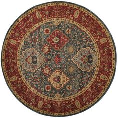 a red and blue rug with an ornate design on the center, surrounded by flowers