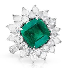 One of a Kind Ring. Outer diameter of ring measures 22mm x 22mm. Center stone Emerald measures 10mm x 10mm. SKU ASRW4237 Carat Weight 4.72ct Emerald || 4.27ct Diamond Metal Type 18KT White Gold Primary Stone Emerald Weight 6.57g Luxury Cluster Diamond Ring With Gemstone, Luxury Cluster Ring With Round Cut Gemstone, Luxury Emerald Ring With Cushion Cut Center Stone, Luxury Cushion Cut Emerald Ring With Center Stone, Luxury Cushion Cut Emerald Ring With Diamond, Cushion Cut Diamond Gemstone Ring, Cushion Cut Diamond Ring With Gemstone, Gia Certified Luxury Cluster Rings, Luxury Gia Certified Cluster Rings