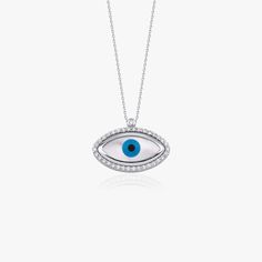 Our unique 14k solid gold diamond evil eye necklace with mother of pearl center.A piece we craft to offer protection and good luck.★ Necklace Features• Gold Karat: 14K Solid Gold (can be crafted in 18k gold upon request)• Gold Color available: White Gold• Total Diamond Weight: 0.24 carat• Diamond Color and Clarity: G Color VS2/SI1 clarity• We only work with real natural diamonds• We include a signed certificate with each piece for the authenticity of the diamonds • Pendant Dimensions: 21.3 mm by Luxury Diamond Jewelry With Evil Eye Detail, Luxury Sterling Silver Evil Eye Jewelry, White Gold Evil Eye Round Jewelry, Silver Diamond Evil Eye Jewelry, White Gold Sterling Silver Necklace With Evil Eye, White Gold Sterling Silver Evil Eye Necklace, White Gold Necklace With Evil Eye, Diamond Amulet Necklace For Gift, White Gold Evil Eye Jewelry