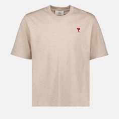 • Round collar
 • Short sleeves
 • Straight cut
 • Red Ami de coeur logo embroidered on the chest
 • Solid color
 • Made from organic cotton
 • Mixed model
 • Several colors available Beige T Shirt, Paris Shirt, Luxury Wardrobe, Beige T Shirts, Paris T Shirt, Ami Paris, Heart Logo, Neutral Beige, Straight Cut