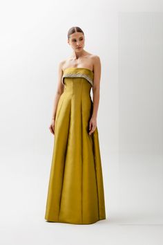 Strapless Naples Gown with Gems on Collar and Bell Skirt. DESCRIPTION Colour: Chartreuse Strapless roll collar, individually hand sewn crystals, boned bodice, slim fitted bodice, bell skirt floor length. Hidden zipper with hook and eye at back. Composition: 51% Silk, 49% Wool Silk Habotai lined Dry clean only Made in C Bell Skirt, Chartreuse Color, Add Sleeves, Rolled Collar, Fashion Gowns, Fitted Bodice, Naples, Pretty Dresses, Hand Sewn