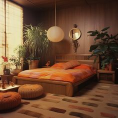 an orange bed in a room with potted plants on the floor and round lights hanging from the ceiling