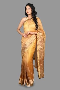 Golden pure tissue silk saree with floral brocade border and tassel detailing. Paired with unstitched blouse piece. - Aza Fashions Elegant Slub Silk Blouse With Dupatta, Elegant Tussar Silk Blouse With Dupatta, Formal Tussar Silk Pre-draped Saree, Elegant Slub Silk Blouse Piece For Wedding, Elegant Wedding Slub Silk Blouse Piece, Elegant Transitional Slub Silk Pre-draped Saree, Formal Pre-draped Saree In Raw Silk With Zari Weaving, Elegant Slub Silk Wedding Blouse, Formal Festive Pre-draped Tussar Silk Saree