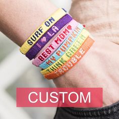 colorful bracelets with words written on them