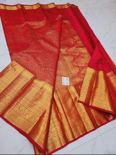 1.this is beautiful pure kanjivaram silk sari with one gram gold zari weaving bridal sari with running blouse piece 2.this sari is 5.5 mt length  3.this is a very elegant looking sari for all occasions like weddings and other formal events  4.fall n pico is complimentary  5.blouse can be made as per the requirements of the clients with proper measurements.stiching charges will be extra  6.plz check the availability of the sari before placing the order Luxury Gold Pre-draped Raw Silk Saree, Gold Silk Pre-draped Saree With Zari Weaving, Traditional Gold Pre-draped Katan Silk Saree, Gold Pre-draped Raw Silk Saree With Zari Weaving, Gold Katan Silk Pre-draped Saree With Pallu, Bridal Sari, Silk Sari, Blouse Piece, Beauty Book