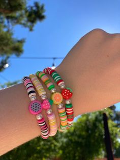 ~Handmade clay Beaded Bracelet 🍉 ~dragon fruit, red strawberry, orange, & pink stawberry bracelets with pearls ♡ ~The string is 6 1/2 inches although I can customize larger or smaller sizes.   (if you want a different size message me the size when ordering) 🍉 ~Stretchy string to fit perfectly around your wrist  ♡   ~Comfortable fit  🍉 ~Can be worn daily  ♡ ~⚠️Would not recommend wearing these in the water⚠️ Dragon Fruit Clay Bead Bracelet, Strawberry Clay Bead Bracelet, Fun Red Beaded Bracelet, Novelty Pink Bracelets With Round Beads, Novelty Pink Friendship Bracelets With Round Beads, Pink Beaded Novelty Friendship Bracelets, Novelty Pink Beaded Friendship Bracelets, Pink Fun Jewelry With Fruit Design, Fun Pink Jewelry With Fruit Design