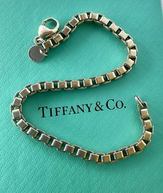 Tiffany And Co Bracelet Silver, Classic Jewelry With Original Box, Formal Rectangular Box Chain Bracelet, Classic White Gold Jewelry With Original Box, Formal Box Chain Bracelet With Rectangular Links, Vintage White Gold Chain Bracelet For Formal Occasions, Formal Box Chain Bracelet With Rectangular Shape, Classic Formal Rectangular Chain Bracelet, Formal Rectangular Chain Bracelet With Box Clasp