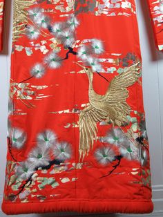 "Vintage 1960s mid century modern wedding kimono robe. Made of bright red/orange silk with metallic silver and gold embroidery. Long kimono with a padded trim hem at bottom. About a size medium. Actual measurements are: 51\" at the bust 51\" at the waist 24.5\" shoulder seam to shoulder seam 13\" shoulder seam to cuff 70\" overall length In very good condition. Has some wear to the bottom edge(photo)." Red Long Kimono For Wedding, Traditional Long Wedding Robe, Long Red Kimono For Wedding, Long Wedding Kimono For Festive Occasion, Red Festive Kimono For Festivals, Traditional Gold Kimono For Wedding, Festive Red Kimono With Kimono Sleeves, Wedding Embroidered Kimono With Kimono Sleeves, Embroidered Wedding Kimono