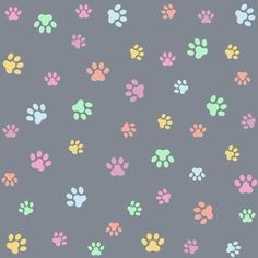 colorful paw prints on a gray background that looks like they are painted with pastel colors