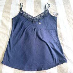 Loft Navy Blue Tank With Lace Size M Cotton In A New With Tags Condition Size M 95% Cotton, 5% Spandex Super Soft Material Armpit To Armpit: 16' Length From Shoulder Down: 24" Casual Blue Camisole For Loungewear, Floral Cami, Crochet Halter Tops, Levi Jeans 501, Pink Tank, Distressed Black Jeans, Navy Floral, Polo Dress, Black Stretch