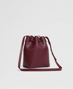 Mini Bucket Bag - Claret Designer Everyday Pouch With Detachable Strap, Designer Bucket Bag With Removable Pouch For Daily Use, Luxury Satchel Pouch With Detachable Handle, Designer Crossbody Pouch For Daily Use, Designer Pouch With Detachable Handle For Everyday, Designer Bucket Bag With Detachable Strap For Everyday Use, Designer Tote Pouch For Everyday Use, Luxury Crossbody Pouch With Detachable Handle, Designer Burgundy Rectangular Bag