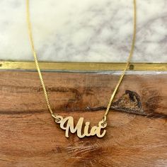 Baby Name Necklace, 14k Solid Gold Necklace, Kid's Name Necklace, Gift for Toddler, Personalized Necklace, Custom Baby Shower Gift Our custom name necklace is a personalized piece that you will cherish forever. The perfect gift for a baby or toddler <3 Made in either 14k gold or 10k gold (not filled or plated) our name pendants are handcrafted and made to order. Customize your name pendant with any letter or number up to 8 characters. For anything more than 8 characters please message us and we Custom Yellow Gold Names Necklace For Gifts, Custom 14k Gold Name Necklace For Gift, Custom 14k Gold Necklace With Name For Gift, 14k Gold Necklaces With Names For Gifts, Adjustable 14k Gold Necklaces For Personalized Gift, Personalized Yellow Gold Nameplate Necklace For Mother's Day, Personalized 14k Gold Necklace For Mother's Day, Personalized 14k Gold Necklace With Names, Custom 14k Gold Necklace With Names For Personalized Gift