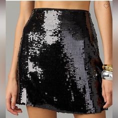 Nwt - Some Of The Sequins Need To Be Adjusted But That’s How I Received It When It Was Shipped. Sits At Waist. Length: 16". Falls Above Knee. 100% Polyester. Back Zip. Lined. Dry Clean. Black Sequined Mini Skirt For Spring, Spring Black Sequin Skirt, Black Sequined Skirt For Spring, Black Mini Length Bottoms For Party Season, Black Short Skirt For Party, Black Short Length Skort For Party, Chic Black Sequin Skirt, Black Mini Length Bottoms With Sequins, Black Sequined Mini Bottoms