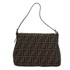 Brand: Fendi Model: Mamma Baguette Color: Brown Material: Canvas Inclusions: Dust bag Dimensions: W29cm x H19cm x D11cm / Shoulder Drop:18 - 23cm Serial number: 2321-26325-099 Country of origin: Italy Condition: AB - good condition. This Fendi Mamma Baguette shoulder bag is a stylish accessory designed for women. Crafted from iconic Zucca canvas in a rich brown and black color scheme, it offers a chic and practical design for everyday use. The exterior features slight loss of shape, with minor r Fendi Mamma Baguette, Practical Design, New Metal, Brown Canvas, Canvas Shoulder Bag, Fendi Bags, Birkin Bag, Stylish Accessories, Dior Saddle Bag