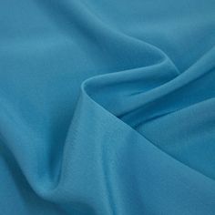 Demuja is a beautiful blue silk crepe de chine fabric, fluid and a great choice for tops, blouses, shirts, dresses and evening gowns. Composition: 100% SE Width: 138cm Colour: blue Pattern: solid Weight: 80gr/m2 Blue Silk Evening Blouse, Blue Silk Blouse For Evening, Blue Satin Blouse For Formal Occasions, Elegant Blue Viscose Blouse, Silk Material, Blue Silk, Silk Crepe, Blue Pattern, Beautiful Blue