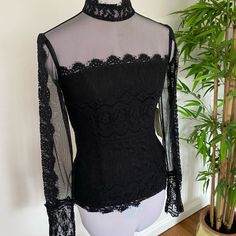 Gorgeous Black Lace Top By Jscollections. Shear On Arms Neck And Dcollet . Zippered Back Then Fabric Buttons Up The Back Size 6 Never Worn. Brand New Form Fitting. Black Fitted Long Sleeve Lace Top, Fitted Black Lace Top With Long Sleeves, Sheer Black Lace Top For Party, Black Lace Top For Party, Sheer Black Lace Top For Evening, Black Sheer Lace Top For Evening, Fitted Black Lace Top For Fall, Fitted Black Lace Top For Evening, Fitted Black Lace Blouse