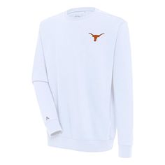 The Men's Antigua White Texas Longhorns Victory Pullover Sweatshirt is the perfect way to show your support for the Texas Longhorns. Made from a lightweight cotton and polyester blend, this sweatshirt is ideal for moderate temperatures. The brushed back fleece provides added warmth, while the rib collar, cuff, and hem ensure a comfortable fit. The embroidered heat-sealed graphics proudly display your Texas Longhorns pride, making this sweatshirt a must-have for any fan. Longhorn Sweatshirt, Texas Longhorns Shirts Ideas, Texas Longhorns Womens Apparel, Texas Longhorns Sublimation, Texas Longhorns Sweatshirt, Quarter Zip Hoodie, Texas Longhorns, Fleece Shorts, Short Sleeve Pullover