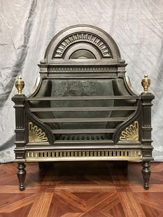 an antique piano sitting on top of a wooden floor